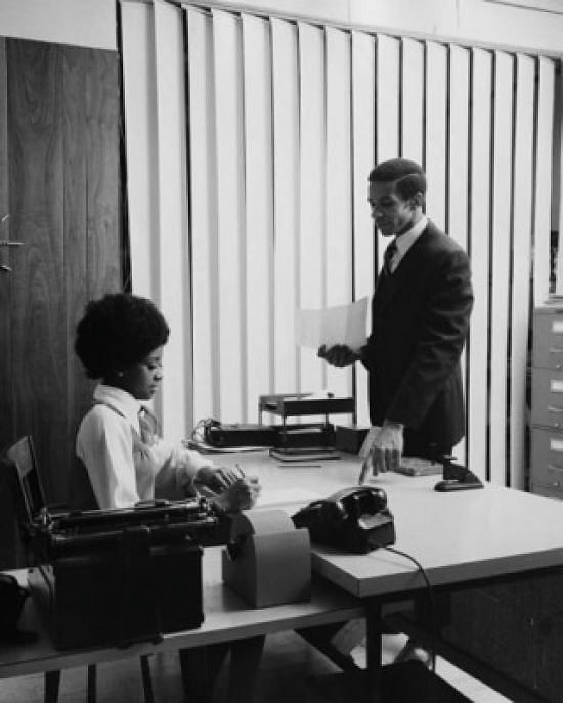 Side profile of businessman dictating letter to his secretary Canvas Art - (18 x 24)