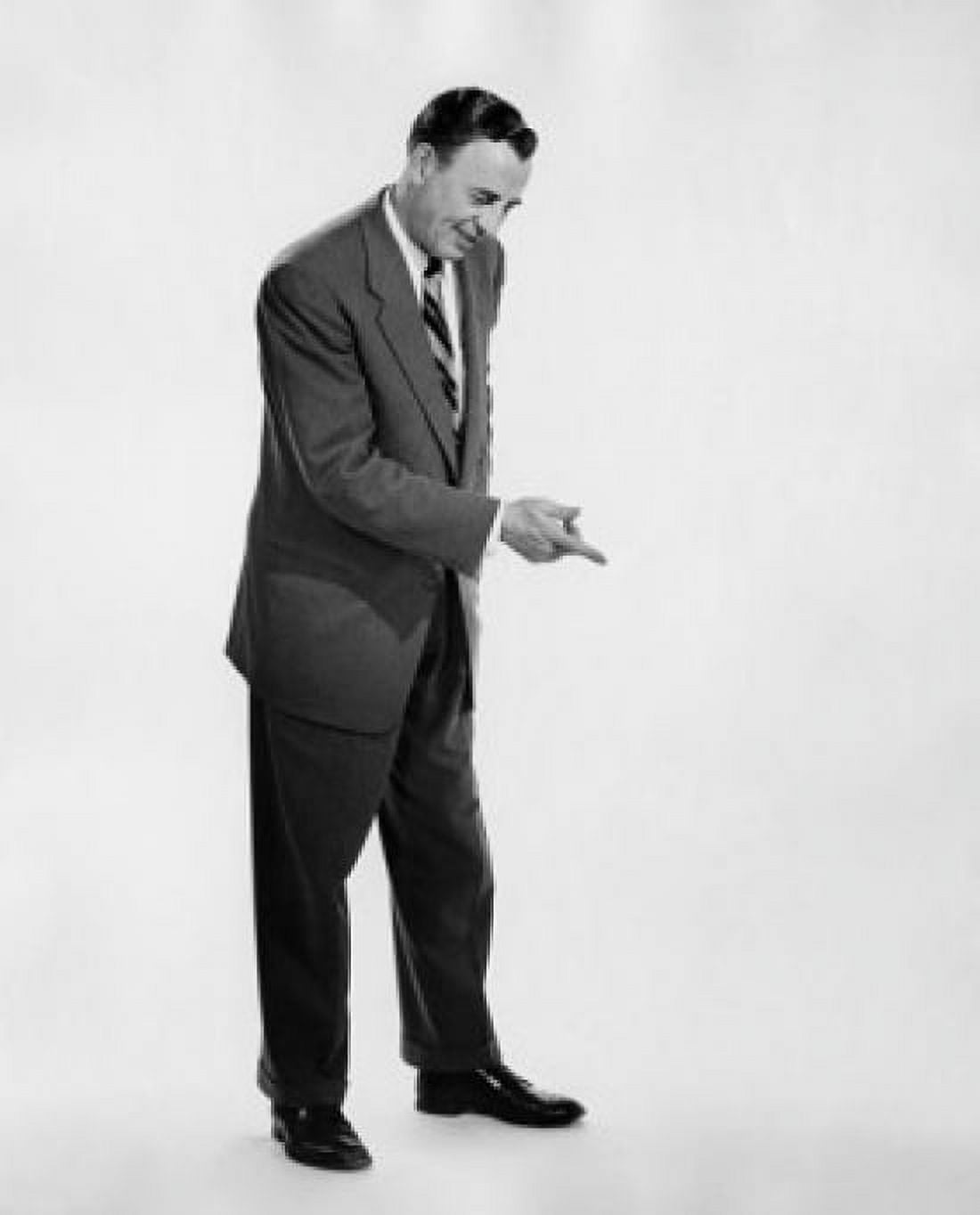 Side profile of businessman pointing downwards Canvas Art - (18 x 24)