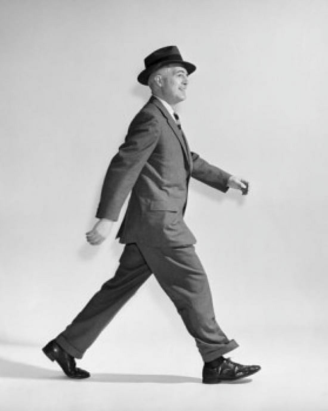 Side profile of businessman walking Canvas Art - (24 x 36)