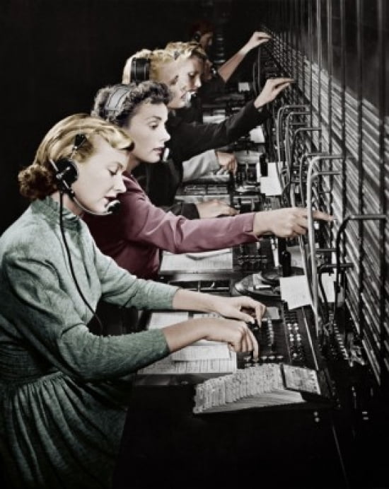 Side profile of group of telephone operators operating switchboards Canvas Art - (18 x 24)