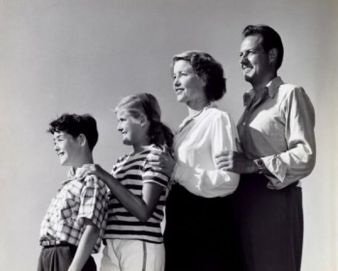 Side profile of parents and their children standing in a row Canvas Art - (18 x 24)