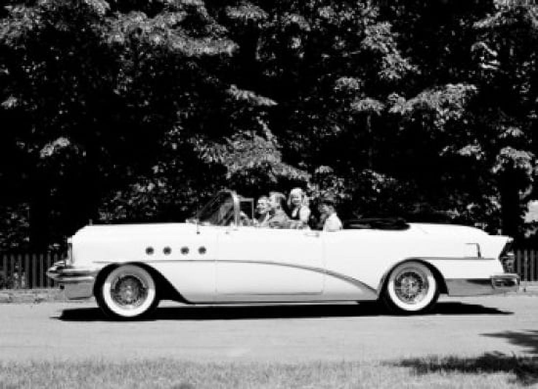 Side profile of parents and their two children traveling in a car Canvas Art - (18 x 24)