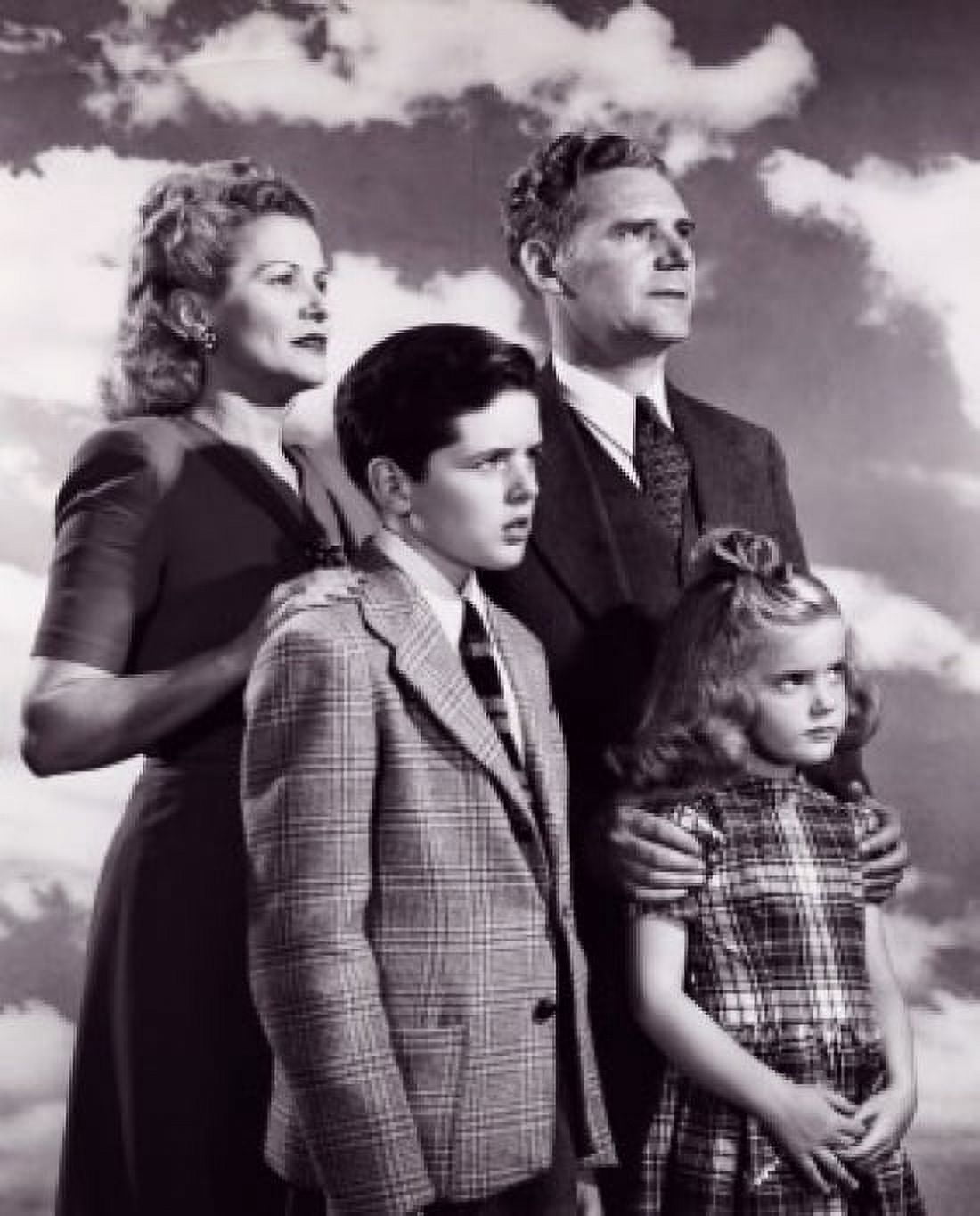 Side profile of parents standing with their children Canvas Art - (24 x 36)