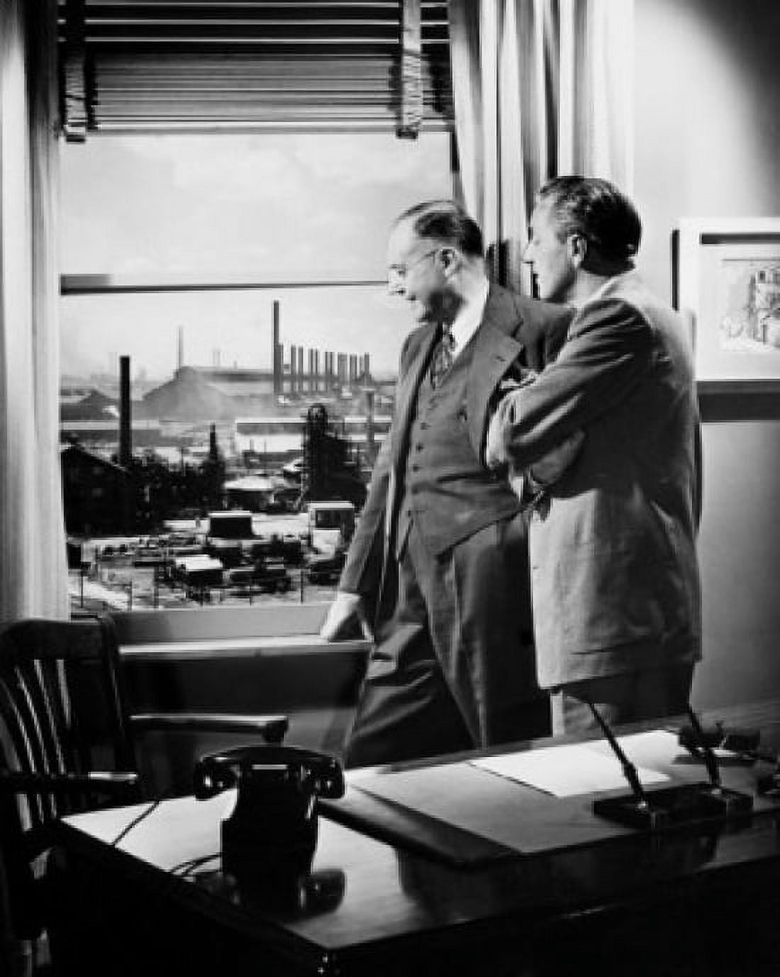 Side profile of two businessmen looking through a window Canvas Art - (18 x 24)