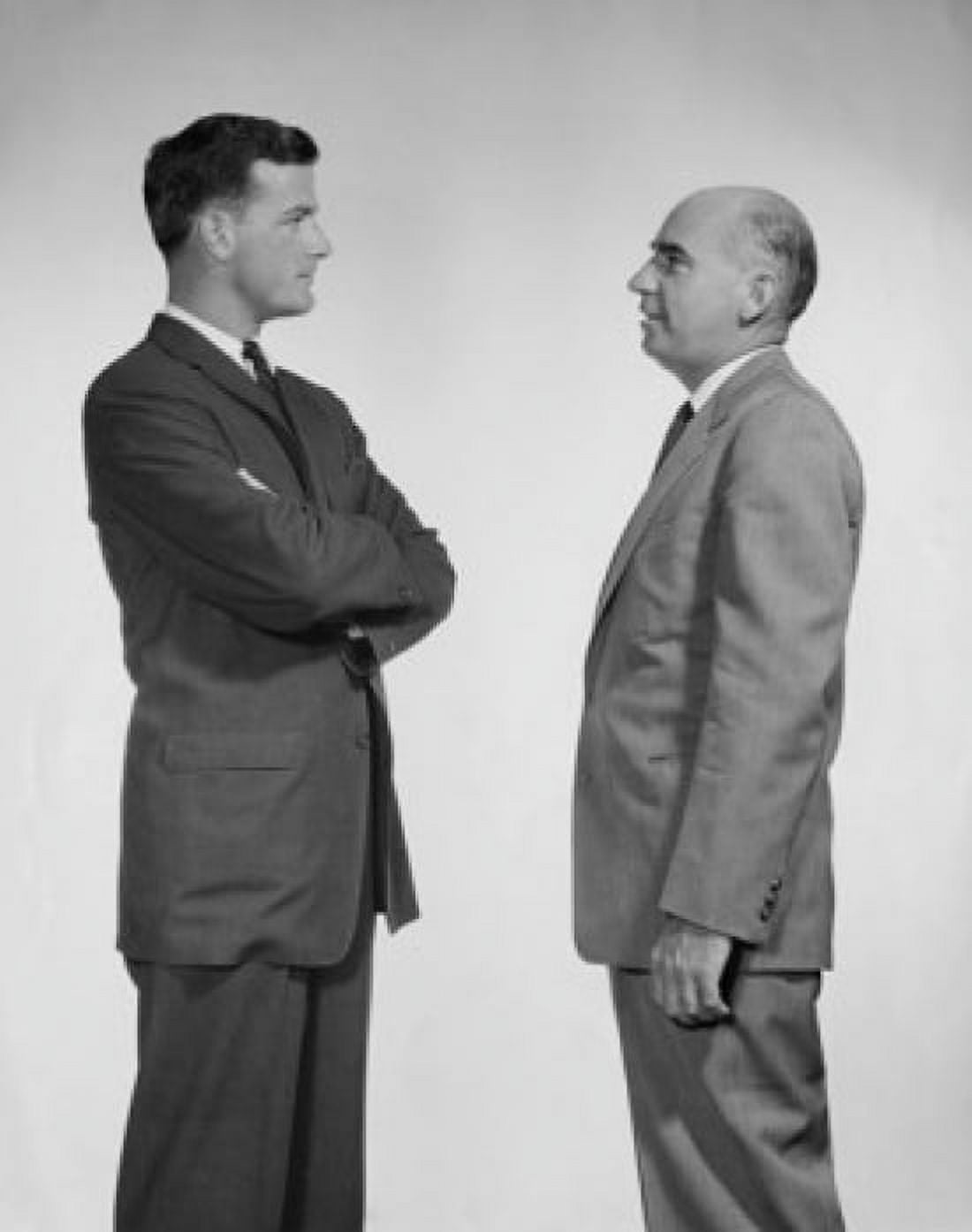Side profile of two businessmen talking Canvas Art - (18 x 24)