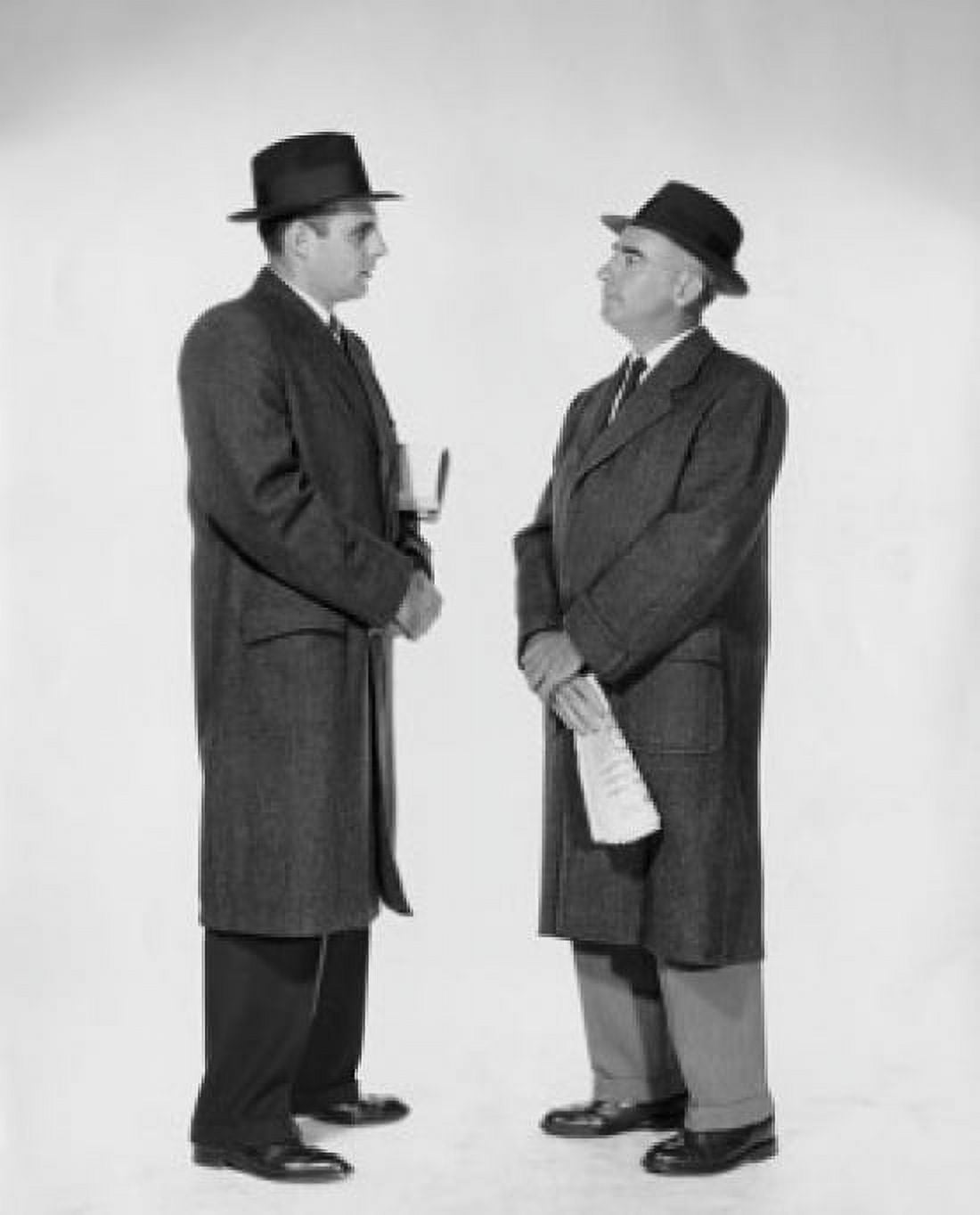 Side profile of two businessmen talking Canvas Art - (24 x 36)