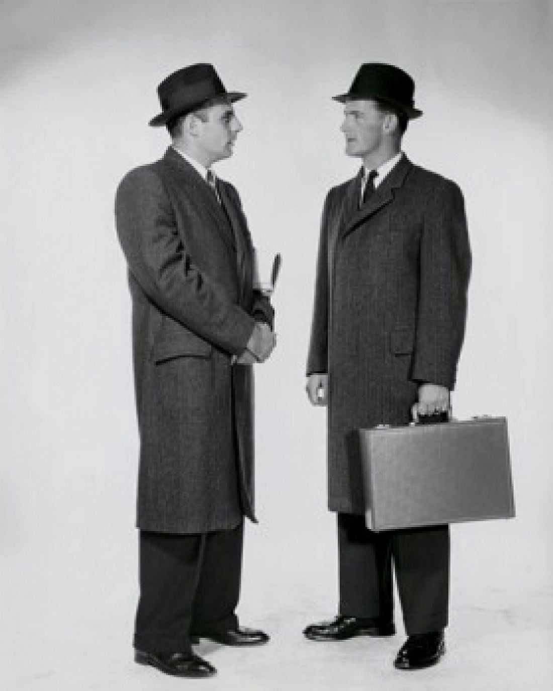 Side profile of two businessmen talking Canvas Art -  (24 x 36)