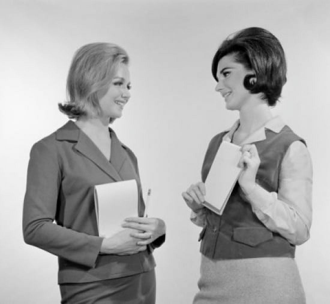 Side profile of two businesswomen smiling Canvas Art - (24 x 36)