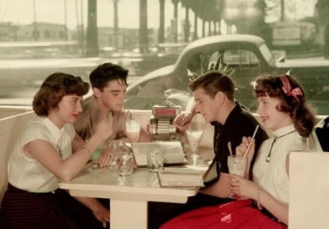 Side profile of two young couples drinking milkshakes at a restaurant Canvas Art - (24 x 36)