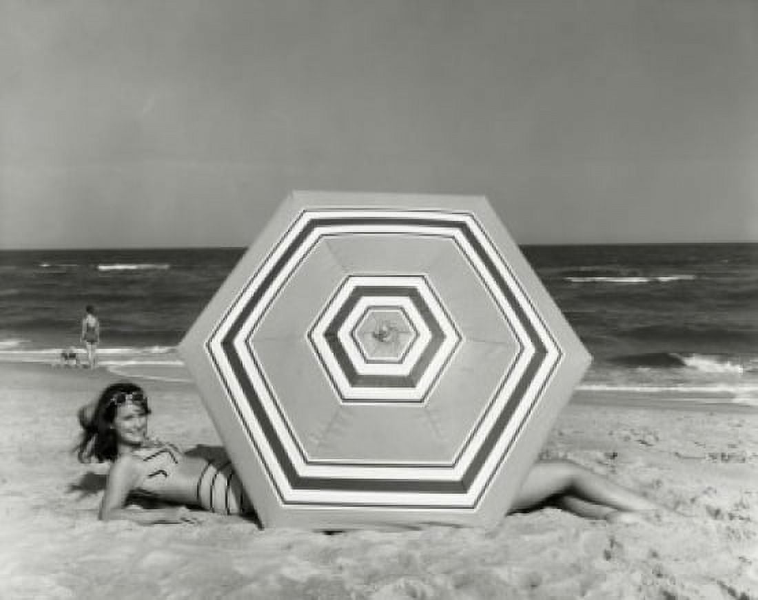 Side profile of young woman lying on beach Canvas Art - (18 x 24)