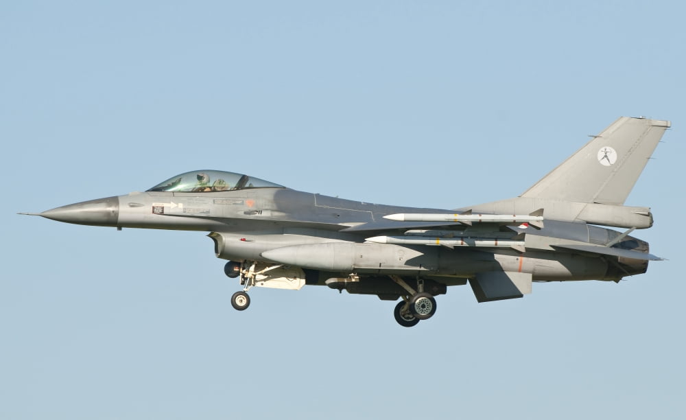 Side view of a Dutch F-16 aircraft Canvas Art - Giovanni CollaStocktrek Images (36 x 22)