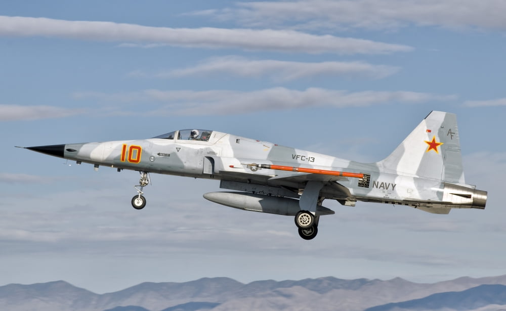 Side view of a F-5N Freedom Fighter aircraft Canvas Art - Giovanni CollaStocktrek Images (36 x 22)