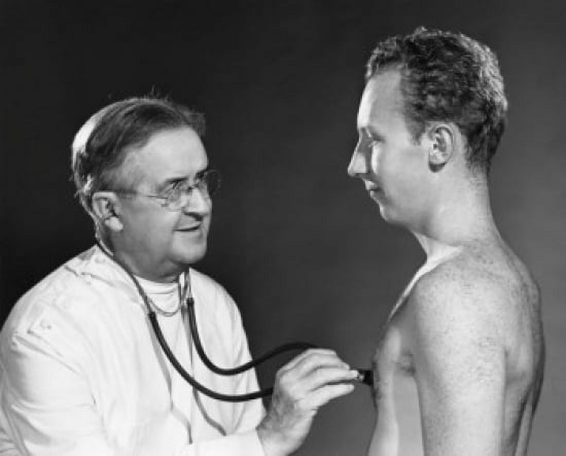 Side view of a male doctor examining a patient Canvas Art - (18 x 24)