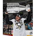 thumbnail image 1 of Sidney Crosby Pittsburgh Penguins Unsigned 2016 Stanley Cup Champions Raising Cup Photograph, 1 of 1