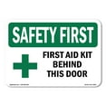 thumbnail image 1 of SignMission OS-SF-D-57-L-10623 OSHA Safety First Sign - First Aid Kit Behind This Door with Symbol, 1 of 5