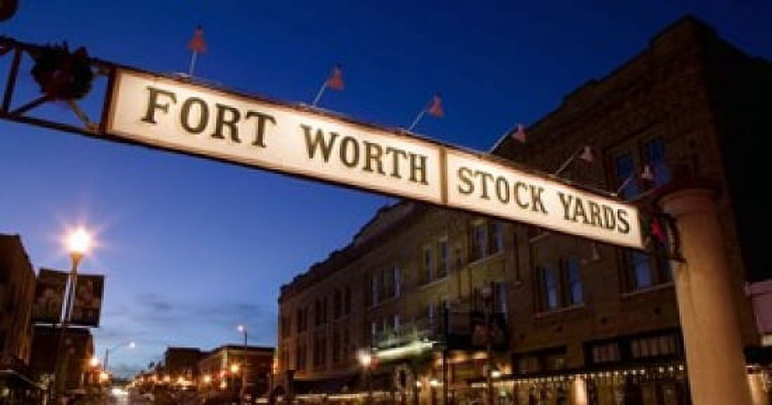 Signboard over a road at dusk Fort Worth Stockyards Fort Worth Texas USA Canvas Art - Panoramic Images (24 x 12)