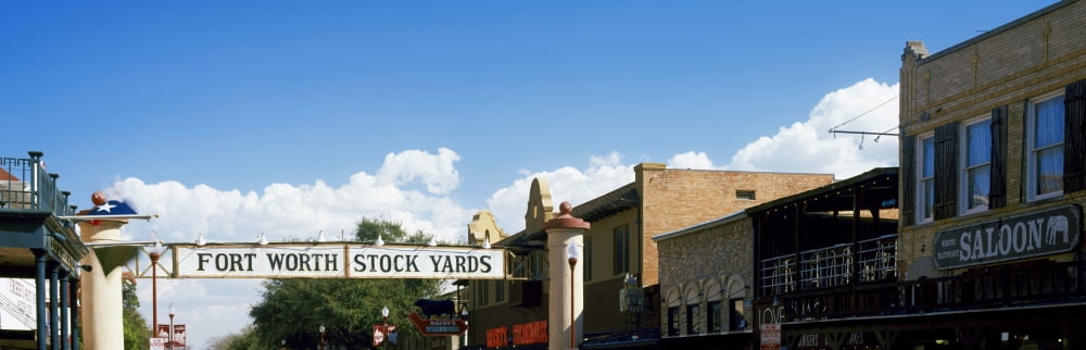 Signboard over a street Fort Worth Stockyards Fort Worth Texas USA Canvas Art - Panoramic Images (27 x 9)