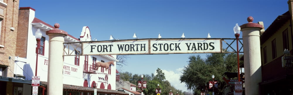 Signboard over a street Fort Worth Stockyards Fort Worth Texas USA Canvas Art - Panoramic Images (36 x 12)