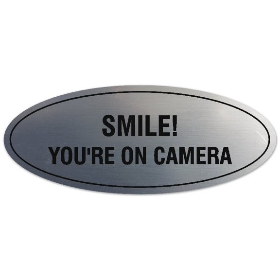 Signs ByLITA Oval Smile You're on Camera Sign - Laser-Engraved Lettering | Durable ABS Plastic | Vibrant Colors | Powerful Foam Tape (Brushed Silver) - Medium