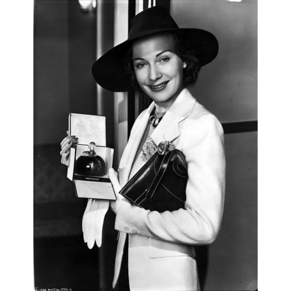 Sigrid Gurie Holding a Box of a Perfume Photo Print (24 x 30)
