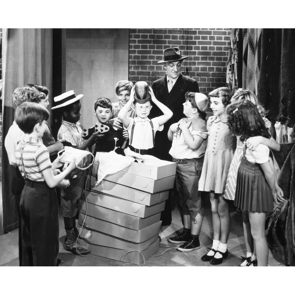 Admire Little Rascal Silent Film Little Rascals. Nfroggy Tries On A Helmet As Alfalfa ...