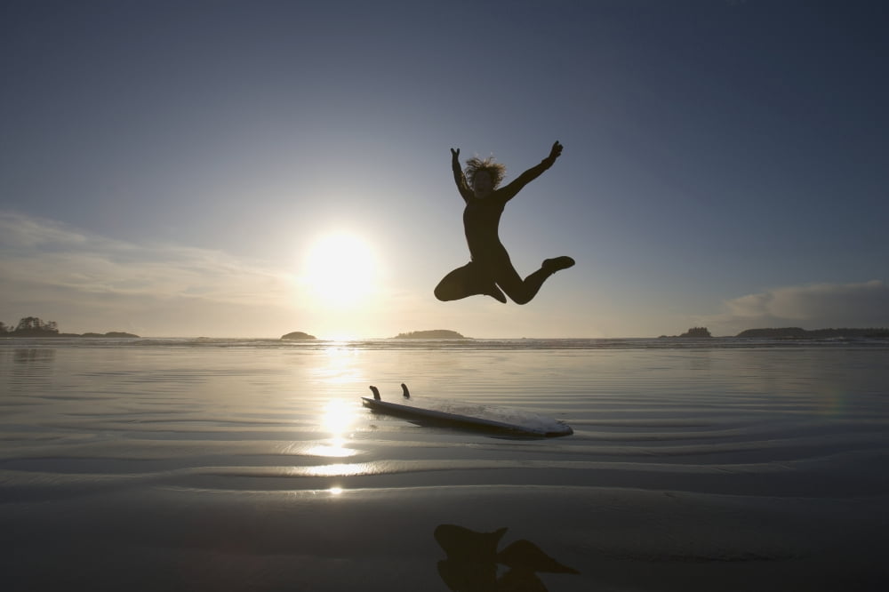 Silhouette Of Female Surfer Jumping For Joy Chesterman Beach Tofino Vancouver Island British Columbia Canada Canvas Art - Deddeda Design Pics (38 x 24)