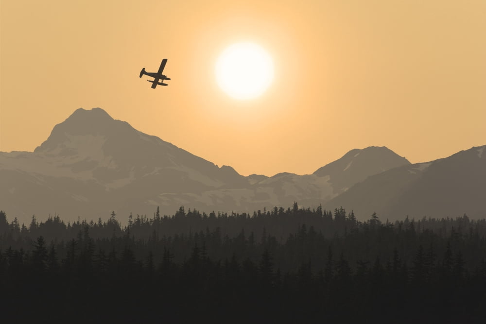 Silhouette Of A Floatplane In Flight Over The Chilkat Mountains At Sunset Tongass National Forest Alaska Canvas Art - John Hyde Design Pics (17 x 11)