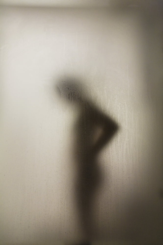 Silhouette Of A Nude Woman Behind The Glass Door Of A Shower Stall Canvas Art - Perry Mastrovito Design Pics (12 x 19)