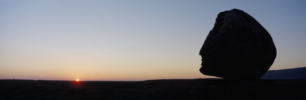 Silhouette Of Head-Shaped Boulder At Dusk Canvas Art - Ian Cumming Design Pics (37 x 12)