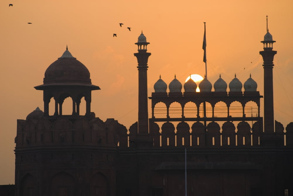 Silhouette Of The Lahori Gate Of The Red Fort With Sun Rising Behind Canvas Art - Ian Cumming Design Pics (19 x 12)