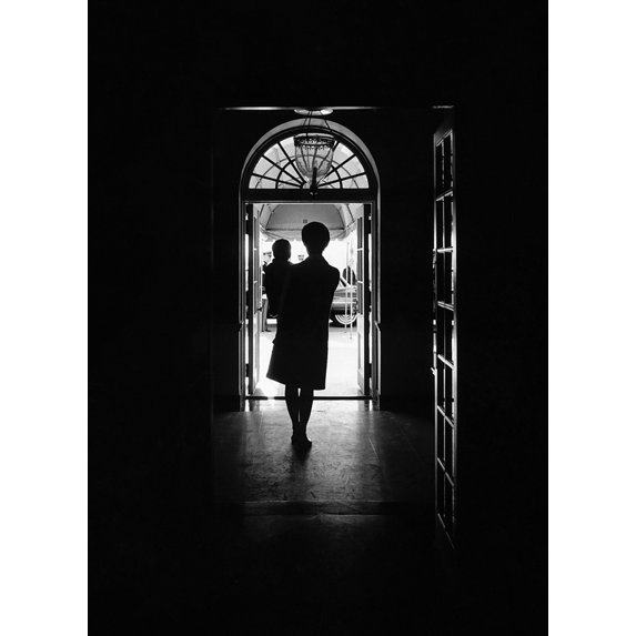 Silhouette Portrait Of Jacqueline Kennedy Carrying Her One Year Old Son John Kennedy Jr. In The White House History (