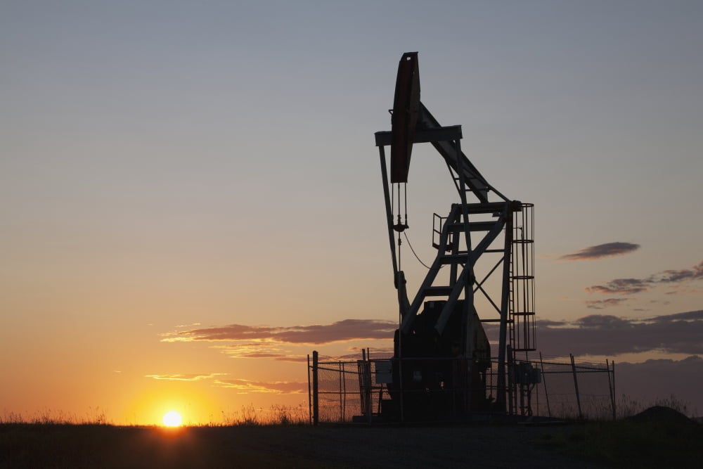 Silhouette Of Pump Jack With The Orange Glow Of The Sun Rising On The Horizon LongviewAlberta Canada Canvas Art - Michael Interisano Design Pics (38 x 24)