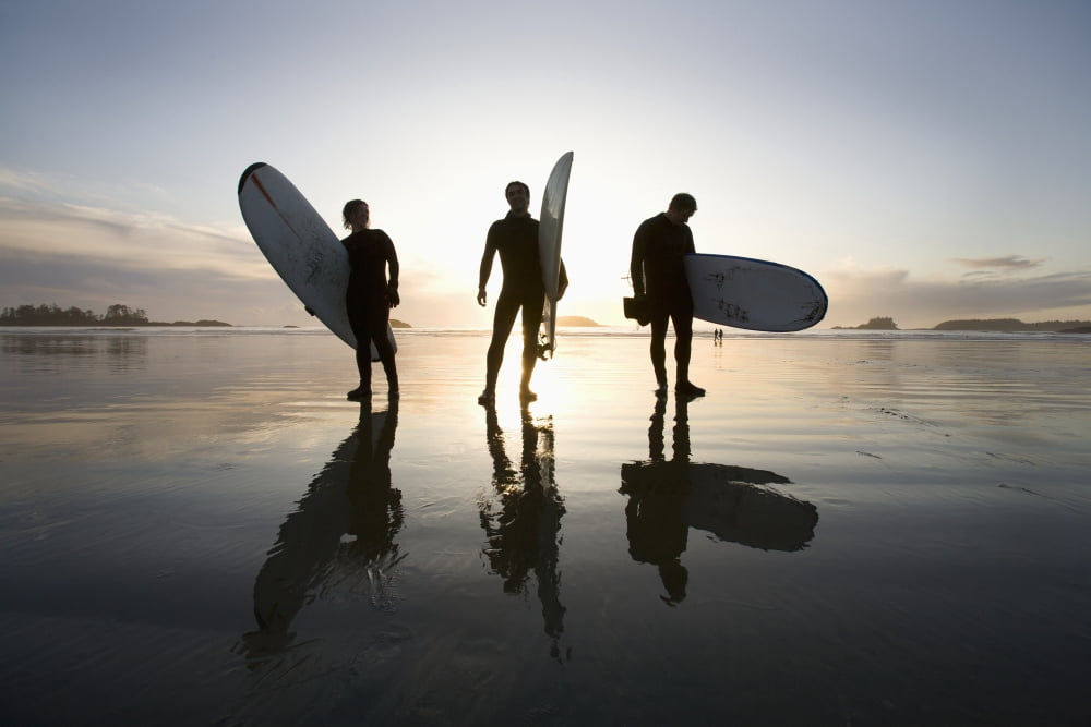 Silhouette Of Three Surfers Carrying Surfboards Chesterman Beach Tofino Vancouver Island British Columbia Canada Canvas Art - Deddeda Design Pics (19 x 12)