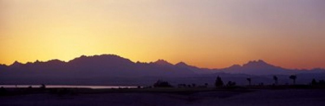 Silhouette of a golf course with Sinai Mountains in the background The Cascades Golf & Country Club Soma Bay Hurghada Egypt Canvas Art - Panoramic Images (18 x 6)