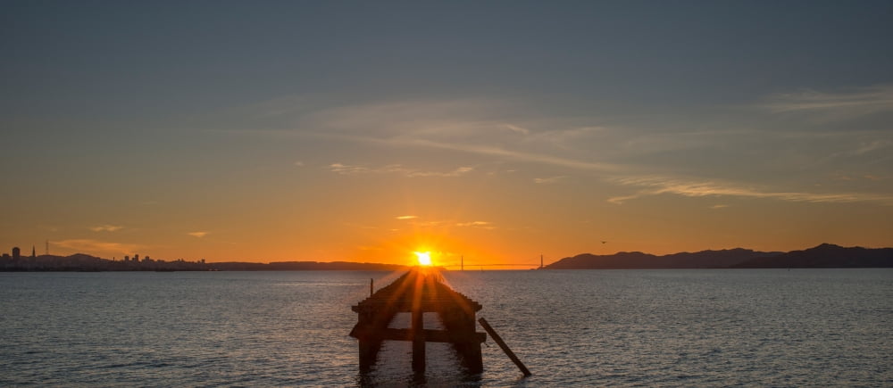 Silhouette of Berkeley Pier at sunset Berkeley California USA Canvas Art - Panoramic Images (27 x 9)