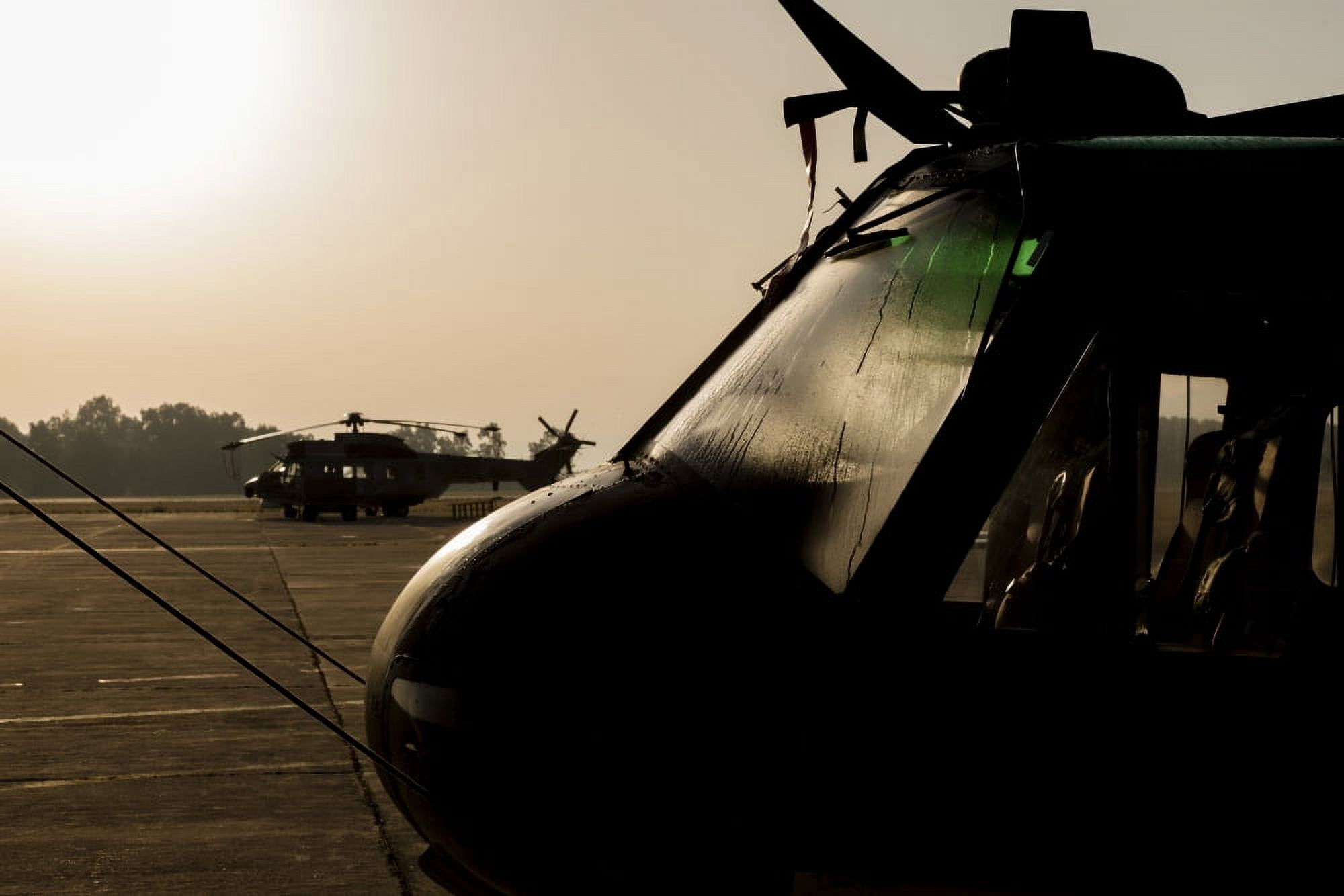 Silhouette of Hellenic Air Force search and rescue helicopters Canvas Art - Timm ZiegenthalerStocktrek Images (34 x 23)