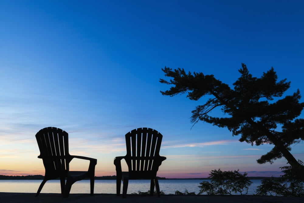 Silhouette of Muskoka chairs and Balsam Lake at sunrise Ontario Canada Canvas Art - Vast Photography Design Pics (19 x 12)