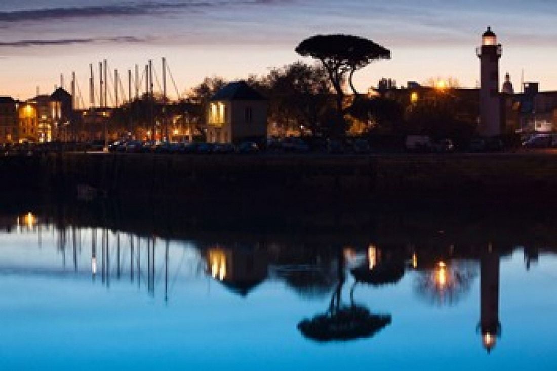 Silhouette of Old Port Lighthouse at dawn La Rochelle Charente-Maritime Poitou-Charentes France Canvas Art - Panoramic Images (36 x 24)