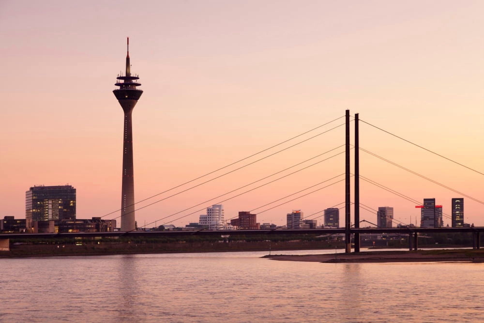 Silhouette of Rheinturm Tower and Rheinkniebrucke Bridge Dusseldorf North Rhine Westphalia Germany Canvas Art - Panoramic Images (36 x 12)