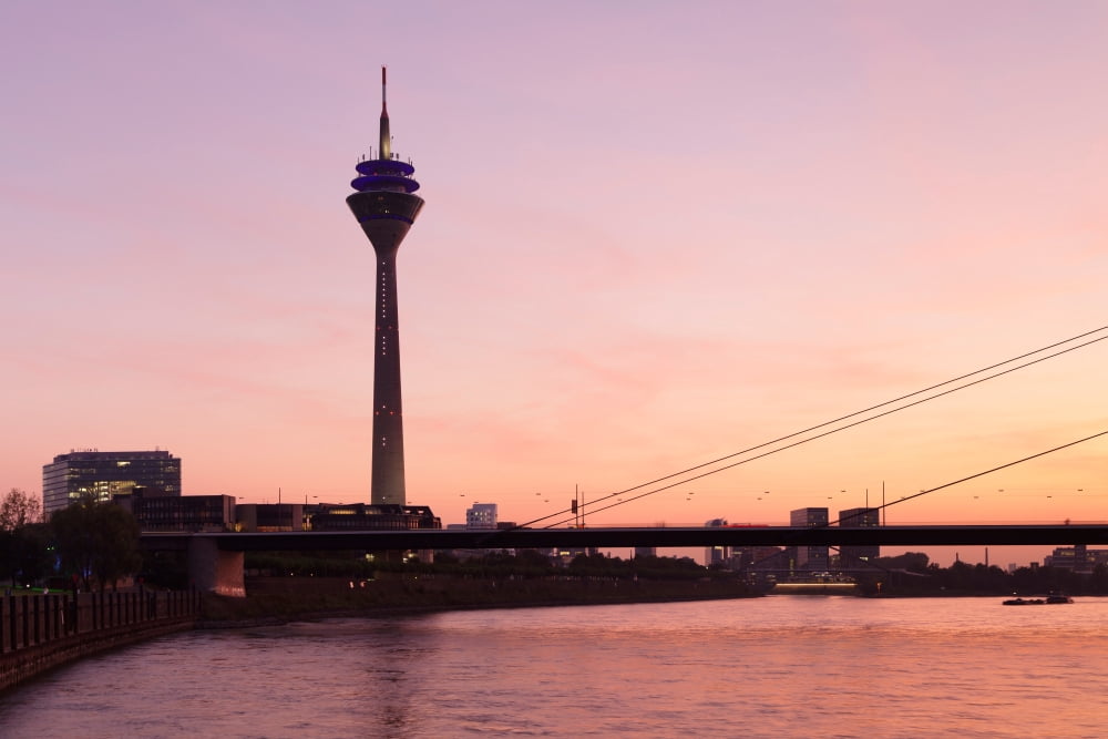 Silhouette of Rheinturm Tower and Rheinkniebrucke Bridge Dusseldorf North Rhine Westphalia Germany Canvas Art - Panoramic Images (36 x 12)