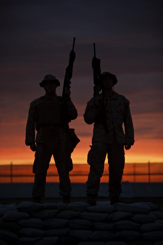Silhouette of US Marines on a bunker at sunset in Afghanistan Canvas Art - Terry MooreStocktrek Images (24 x 35)