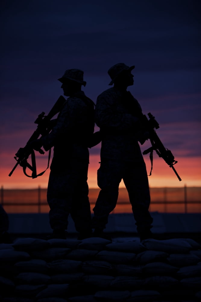 Silhouette of US Marines on a bunker at sunset in Afghanistan Canvas Art - Terry MooreStocktrek Images (24 x 35)