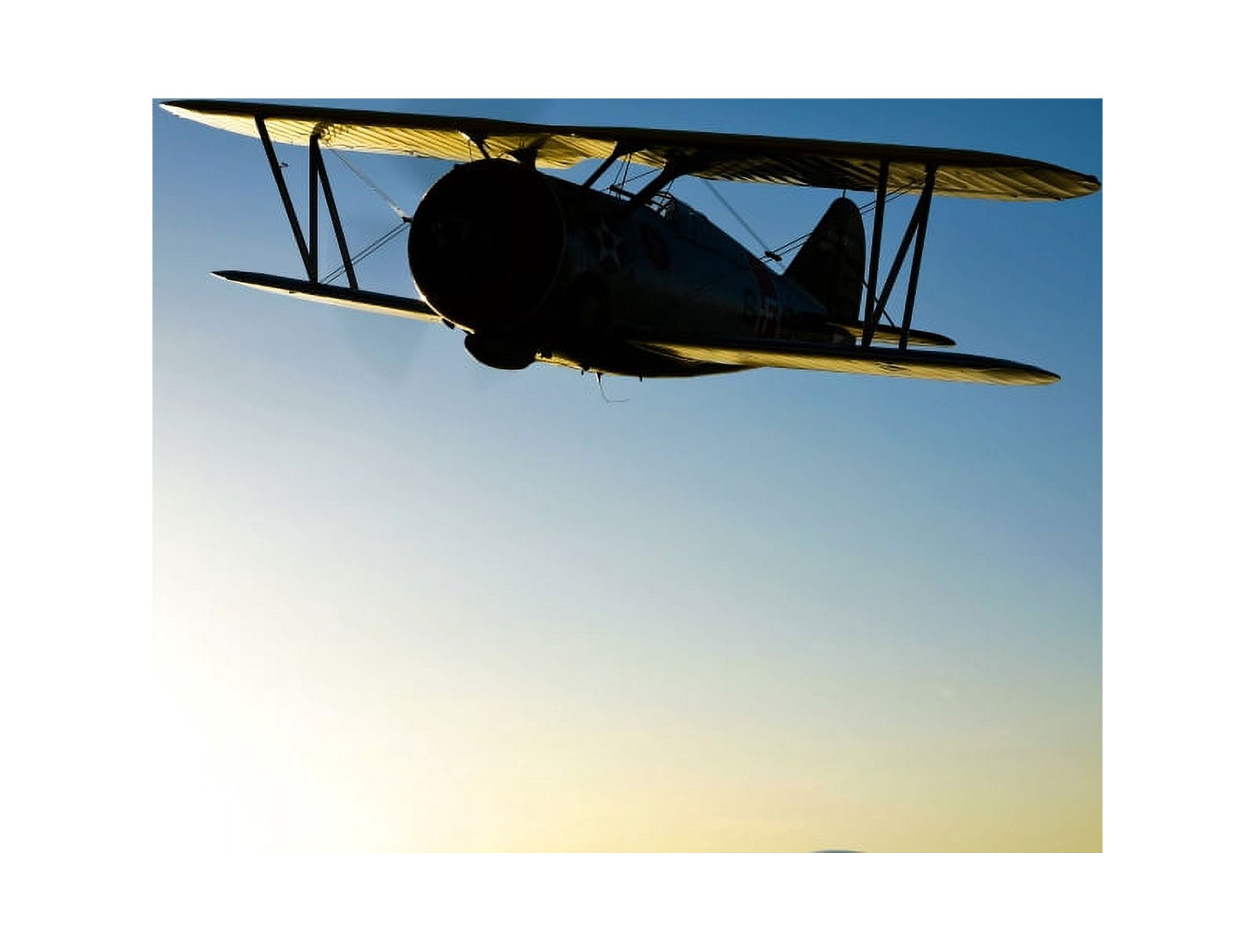 Silhouette of a Grumman F3F biplane in flight Canvas Art - Scott GermainStocktrek Images (16 x 13)