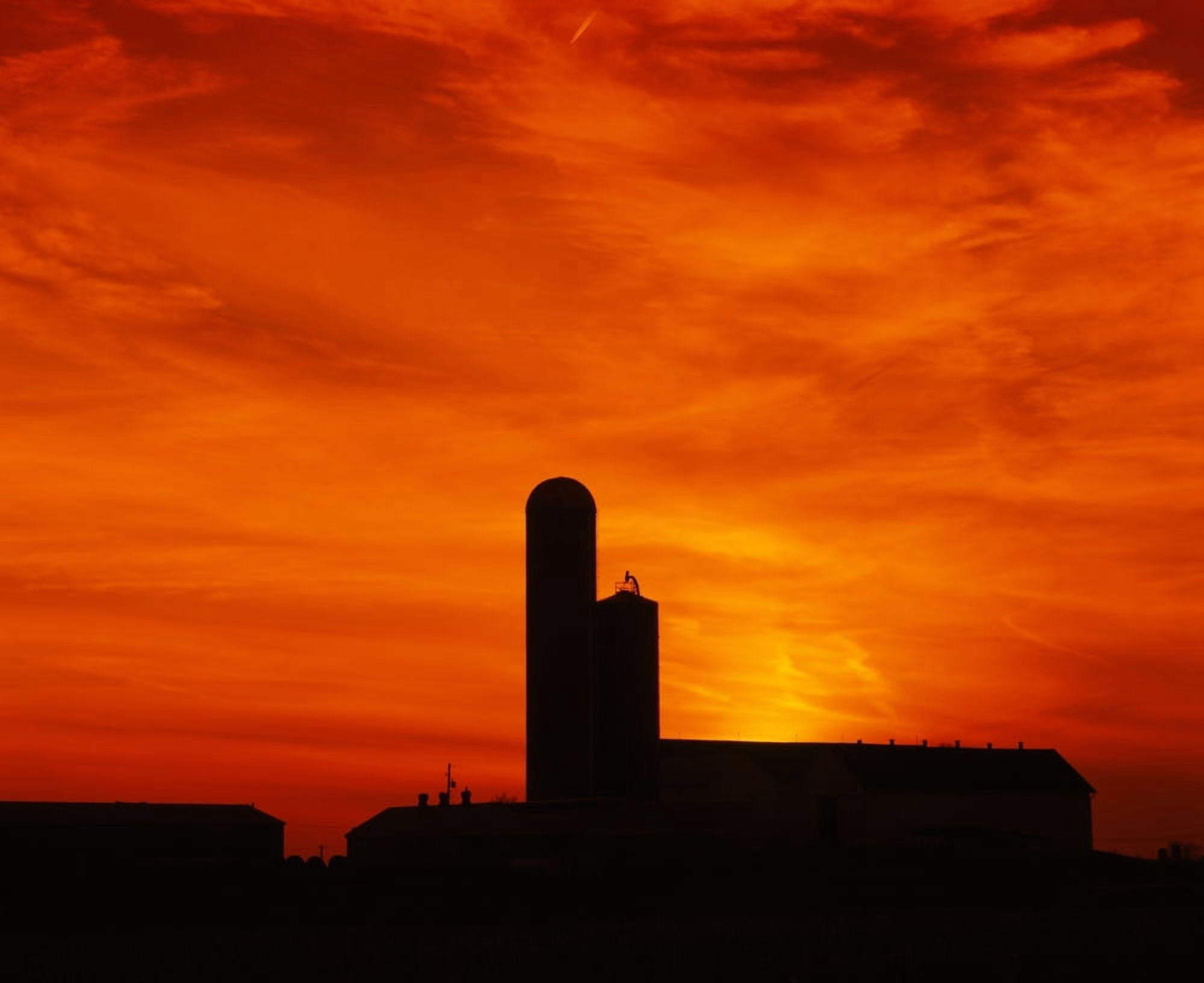 Silhouette of a barn and a silo at sunset Pennsylvania USA Canvas Art - Panoramic Images (29 x 36)
