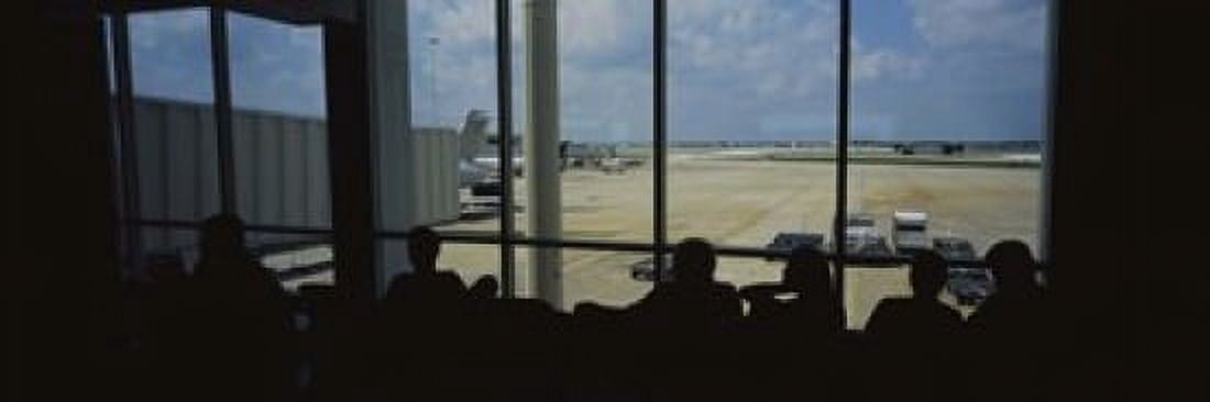 Silhouette of a group of people at an airport lounge Orlando International Airport Orlando Florida USA Canvas Art - Panoramic Images (18 x 6)