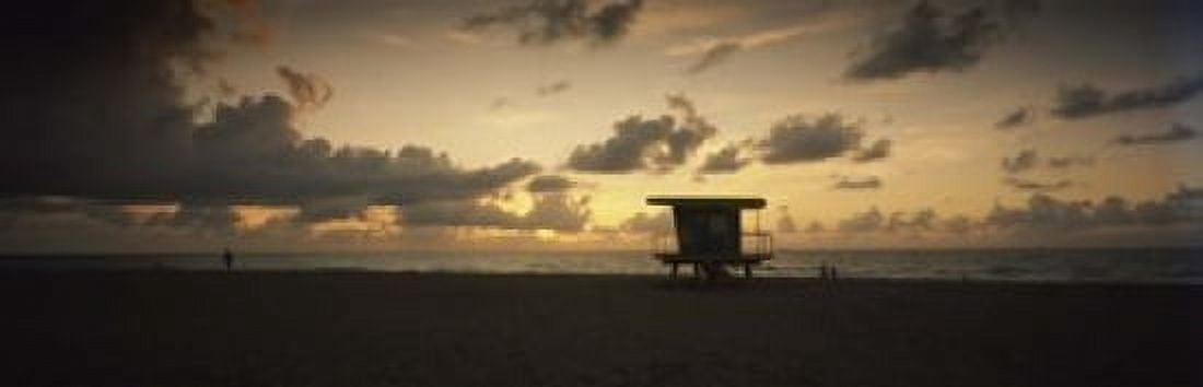 Silhouette of a lifeguard hut on the beach South Beach Miami Beach Miami-Dade County Florida USA Canvas Art - Panoramic Images (18 x 6)
