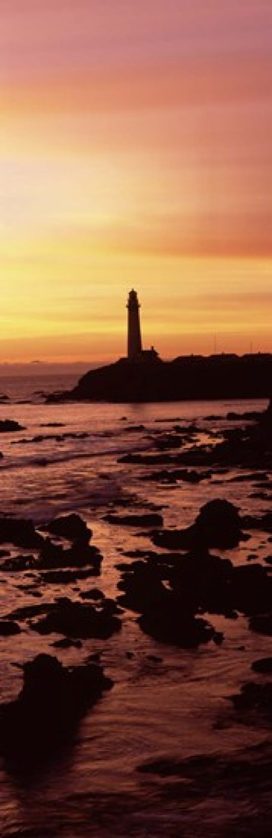Silhouette of a lighthouse at sunset Pigeon Point Lighthouse San Mateo County California USA Canvas Art - Panoramic Images (18 x 6)