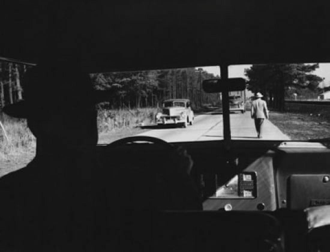 Silhouette of a man driving a car Canvas Art - (24 x 36)