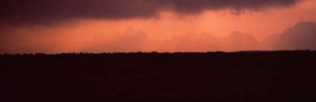 Silhouette of a mountain range at dusk Teton Range Grand Teton National Park Wyoming USA Canvas Art - Panoramic Images (18 x 6)