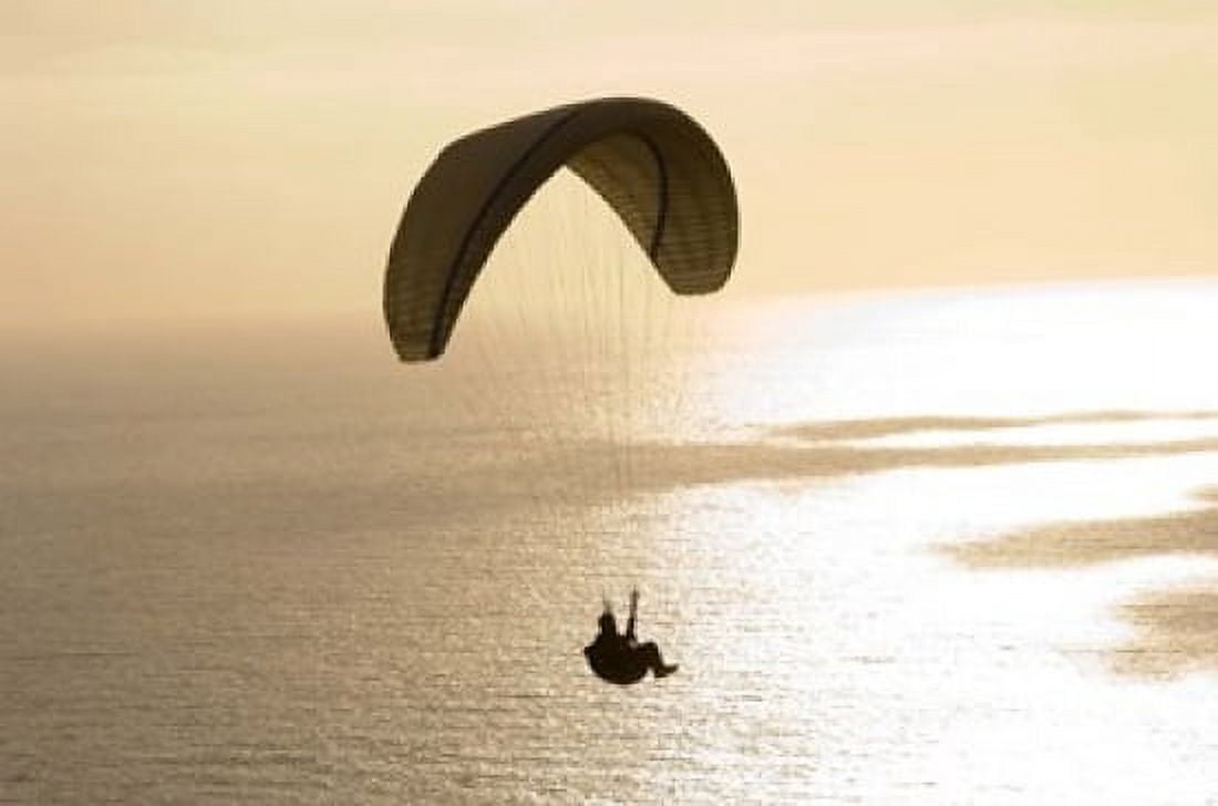 Silhouette of a paraglider flying over an ocean Pacific Ocean San Diego California USA Canvas Art - Panoramic Images (16 x 11)